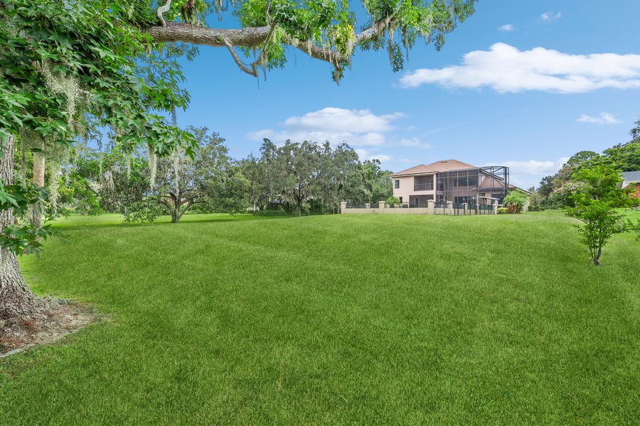 Real Estate Photography - 1900 N Lake Eloise Dr, Winter Haven, FL, 33884 - Back Yard