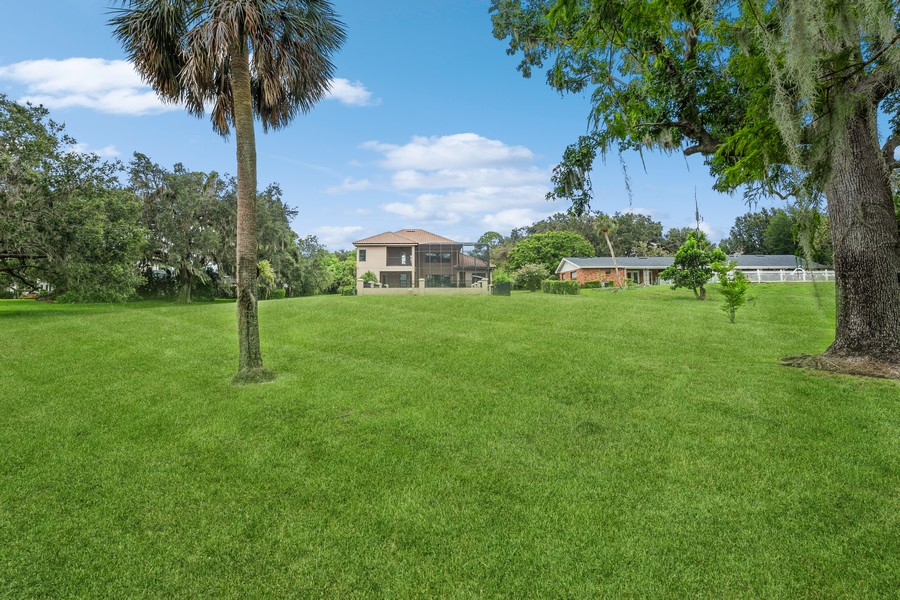 Real Estate Photography - 1900 N Lake Eloise Dr, Winter Haven, FL, 33884 - Back Yard