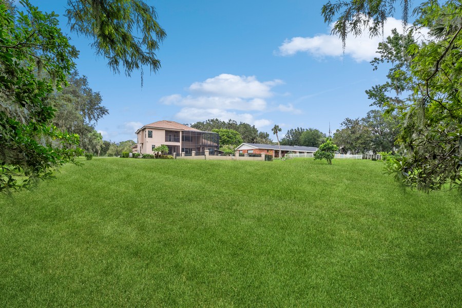 Real Estate Photography - 1900 N Lake Eloise Dr, Winter Haven, FL, 33884 - Side Yard