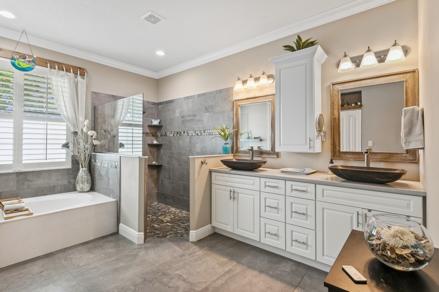 Real Estate Photography - 472 SW Vista Lake Drive, Port Saint Lucie, FL, 34953 - Primary Bath Double Vanity Walk-In Shower Soaking 