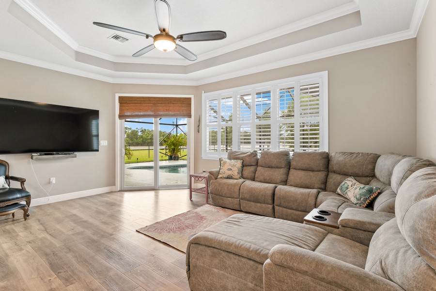 Real Estate Photography - 472 SW Vista Lake Drive, Port Saint Lucie, FL, 34953 - Family Living Area overlooking Pool