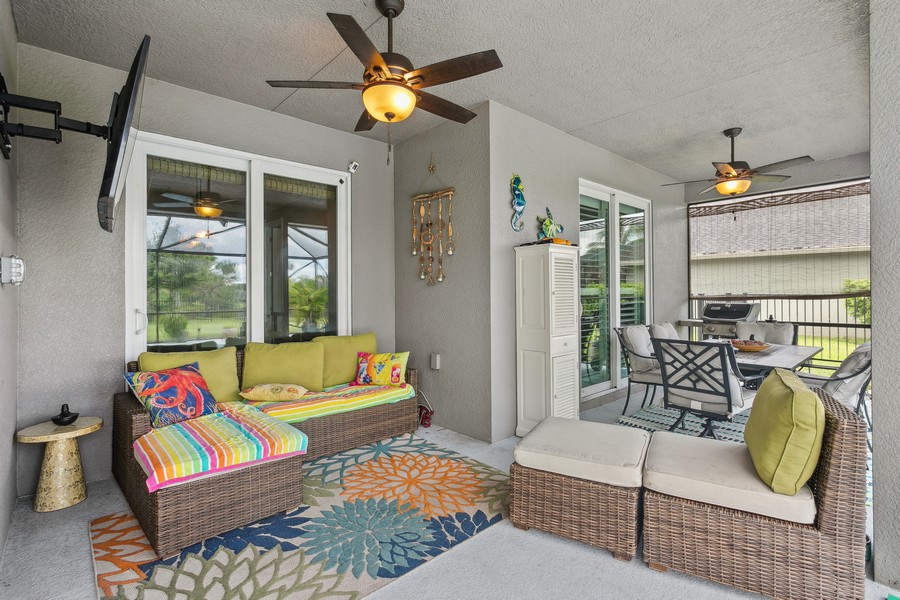 Real Estate Photography - 472 SW Vista Lake Drive, Port Saint Lucie, FL, 34953 - Covered Patio Sitting Area