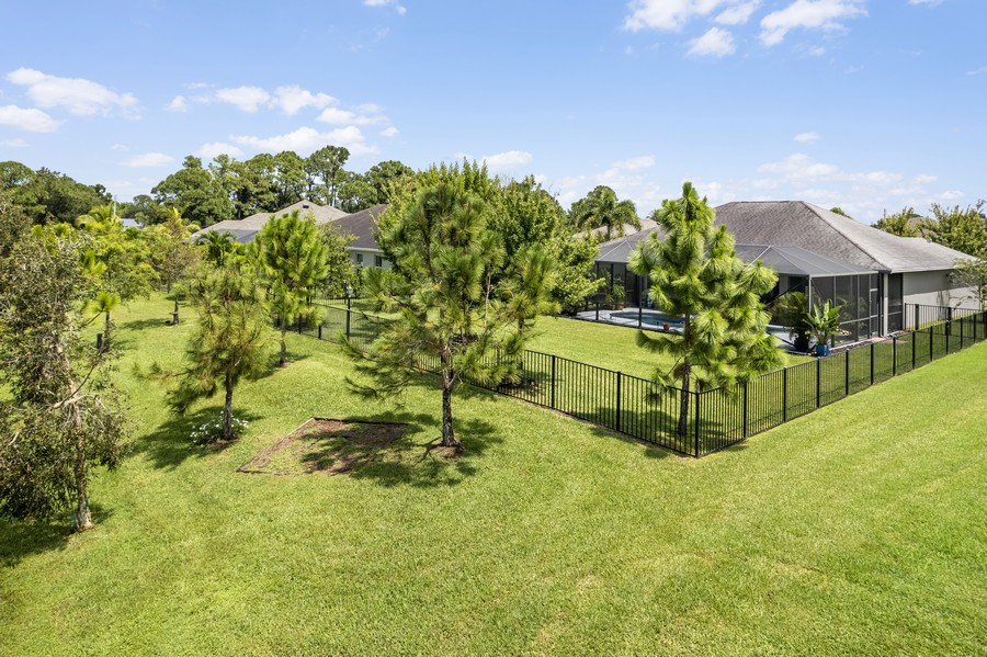 Real Estate Photography - 472 SW Vista Lake Drive, Port Saint Lucie, FL, 34953 - Fully Fenced Rear View