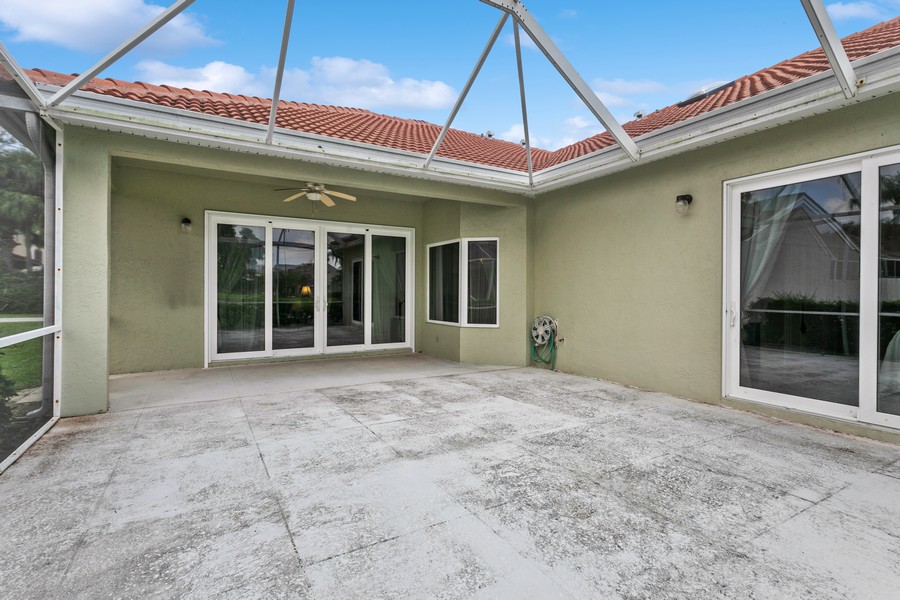 Real Estate Photography - 117 N Lakeshore Drive, Hypoluxo, FL, 33462 - Large Screen Enclosed Patio