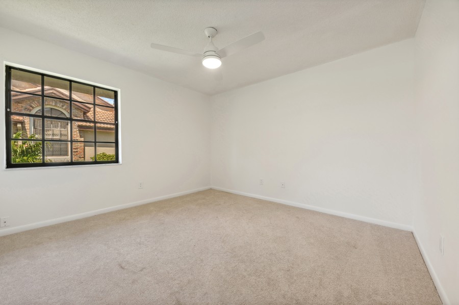 Real Estate Photography - 7219 Le Chalet Blvd, Boynton Beach, FL, 33472 - 2nd Bedroom