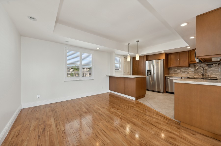 Real Estate Photography - 1 HARBOURSIDE DR, Delray Beach, FL, 33483 - Kitchen / Dining Room