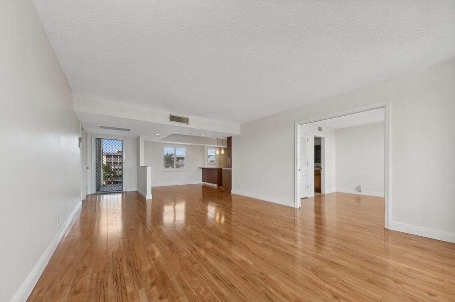 Real Estate Photography - 1 HARBOURSIDE DR, Delray Beach, FL, 33483 - Living Room / Dining Room