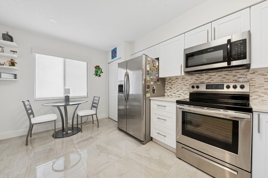 Real Estate Photography - 14475 Strathmore Lane apt.508, Delray Beach, FL, 33446 - Kitchen / Breakfast Room